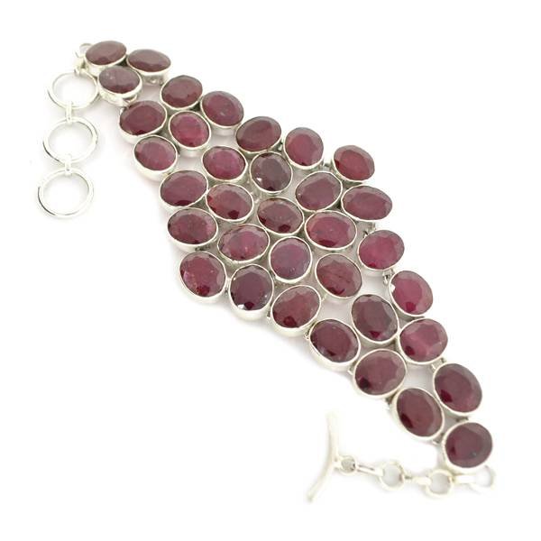 APP: 10k 109CT Oval Cut Ruby & Sterl Silver Bracelet: 109.71CT Oval Cut Ruby and Sterling Silver Bracelet - Appraisal Value: $10.2K