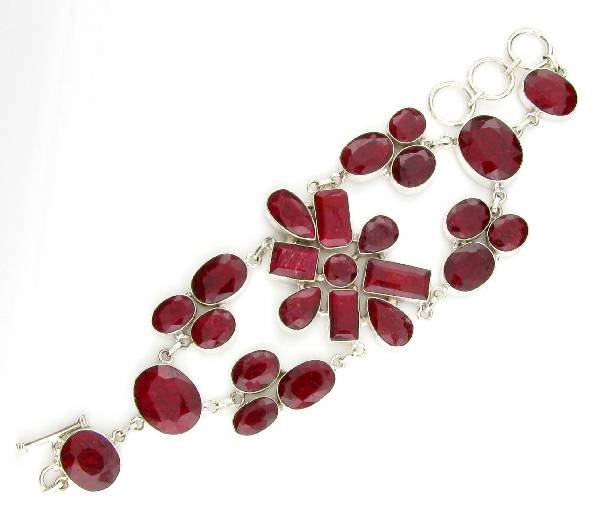 APP: 9k 104CT Mixed Cut Ruby & Sterl Silver Bracelet: 104.25CT Mixed Cut Ruby and Sterling Silver Bracelet - Appraisal Value: $9.6K <