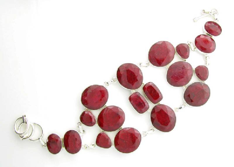APP: 13k 185CT Mixed Cut Ruby & Sterl Silver Bracelet: 185.20CT Mixed Cut Ruby and Sterling Silver Bracelet - Appraisal Value: $13.3K