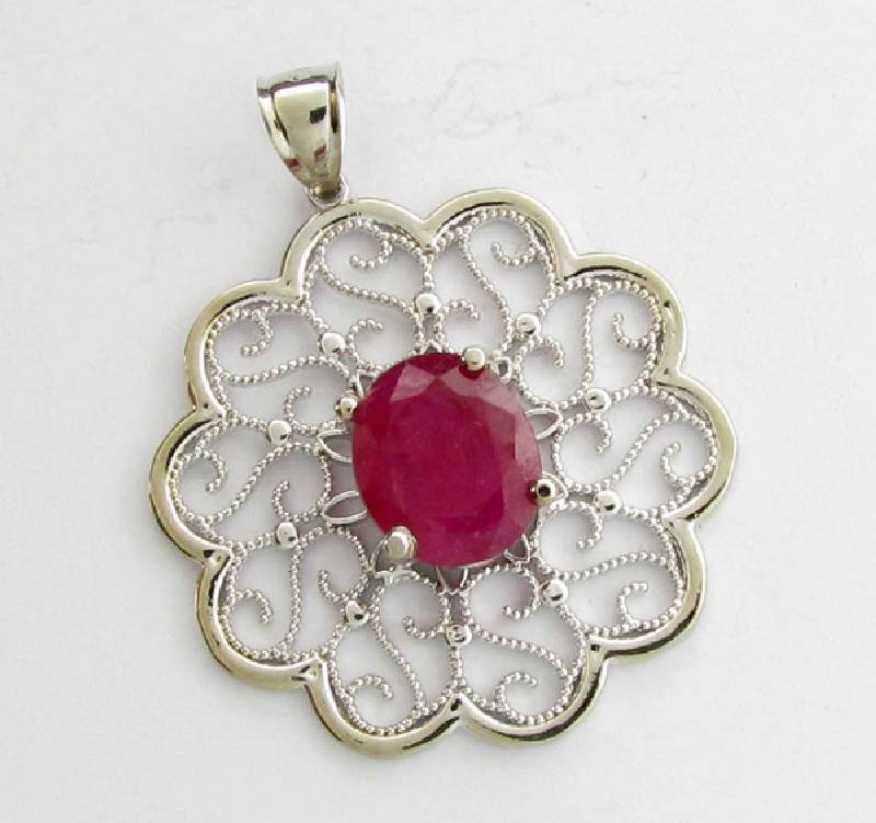 APP: 11k 8.18CT Oval Cut Ruby & Sterling Silver Pendant: 8.18CT Oval Cut Ruby and Sterling Silver Pendant - Appraisal Value: $11.0K