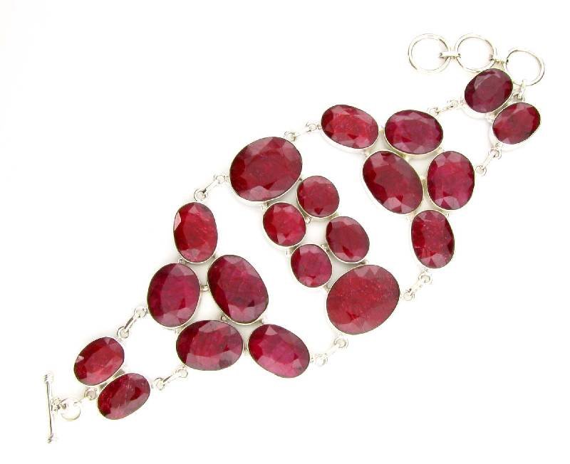 APP: 15k 193CT Oval Cut Ruby & Sterl Silver Bracelet: 193.29CT Oval Cut Ruby and Sterling Silver Bracelet - Appraisal Value: $15.8K <