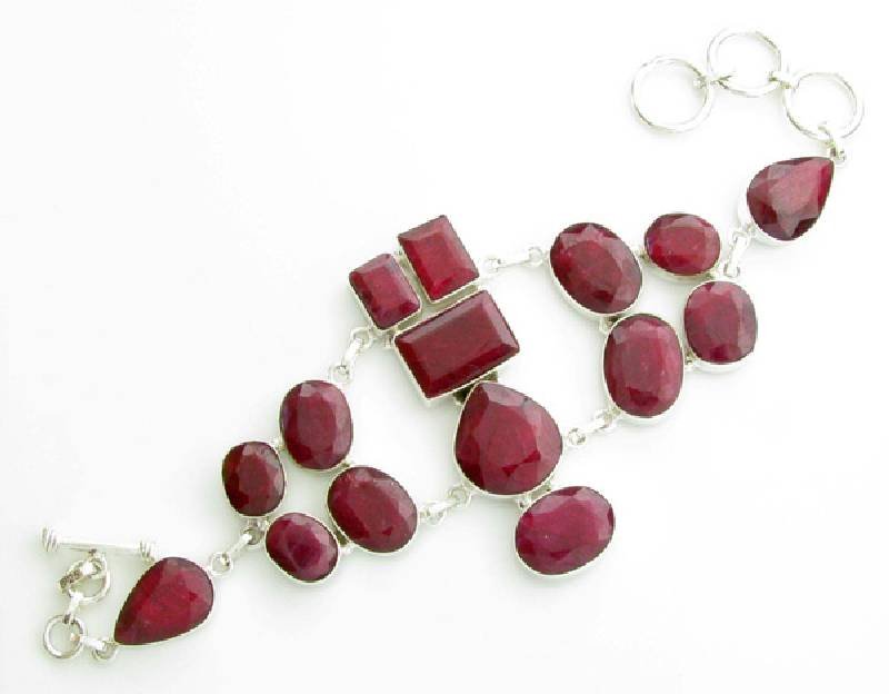 APP: 11k 135CT Mixed Cut Ruby & Sterl Silver Bracelet: 135.87CT Mixed Cut Ruby and Platinum Over Sterling Silver Bracelet - Appraisal Value: $11.0K
