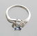 APP: 1k CT Tanzanite & Diamond Plat Sterl Silver Ring