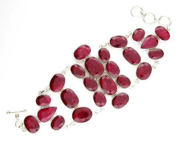 APP: 14k 172CT Mixed Cut Ruby & Sterl Silver Bracelet: 172.20CT Mixed Cut Ruby and Sterling Silver Bracelet - Appraisal Value: $14.7K