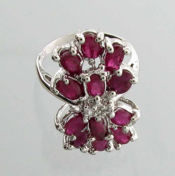 APP: 4.4k 2.81CT Oval Cut Ruby & Sterling Silver Ring: 2.81CT Oval Cut Ruby and Sterling Silver Ring - Appraisal Value: $4.3K