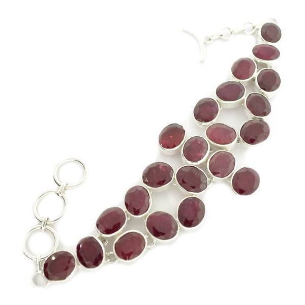 APP: 8k 71 CT Oval Cut Ruby & Sterling Silver Bracelet: 71.58CT Oval Cut Ruby and Sterling Silver Bracelet - Appraisal Value: $8.4K