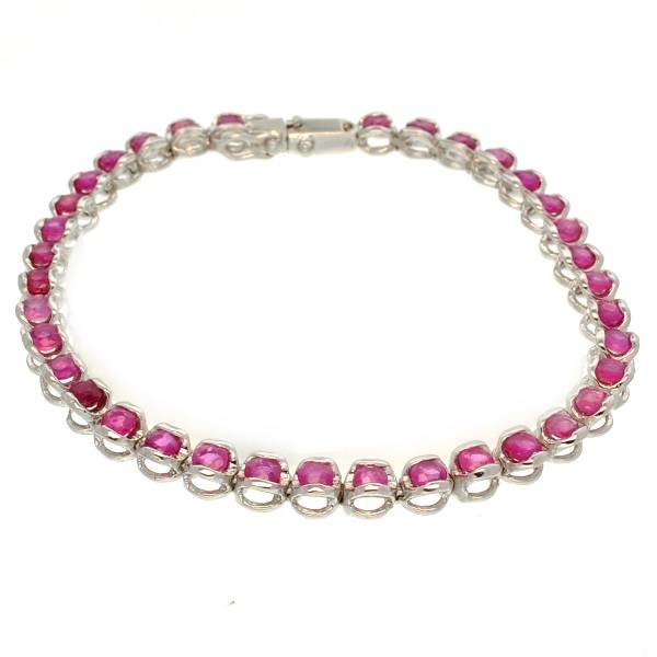 APP: 4k 5CT Round Cut Ruby & Sterl Silver Bracelet: 5.53CT Round Cut Ruby and Platinum Over Sterling Silver Bracelet - Appraisal Value: $3.9K