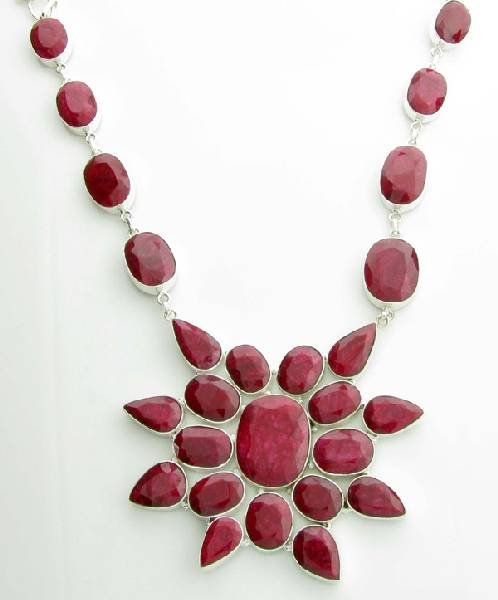APP: 22k 321CT Mixed Cut Ruby & Sterl Silver Necklace: 321.58CT Mixed Cut Ruby and Sterling Silver Necklace - Appraisal Value: $22.4K