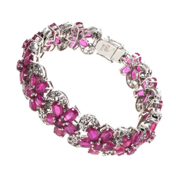 APP: 28k 35CT Ruby & Topaz Sterl Silver Bracelet: 35.68CT Ruby and Topaz Platinum Over Sterling Silver Bracelet - Appraisal Value: $28.5K