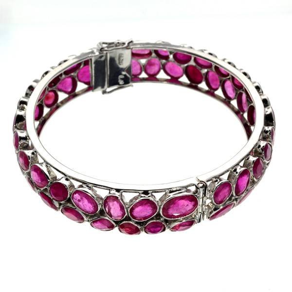 APP: 22k 55CT Mixed Cut Ruby & Sterl Silver Bracelet: 55.88CT Mixed Cut Ruby and Platinum Over Sterling Silver Bracelet - Appraisal Value: $22.5K