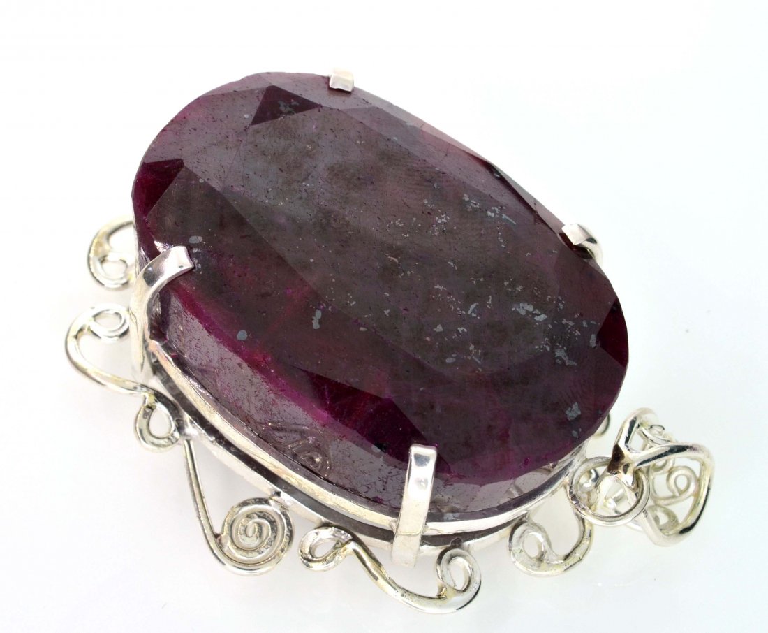 APP: 18k Sebastian 435CT Oval Cut Ruby & Silver Pendant: Designer Sebastian 435.83CT Oval Cut Ruby and Sterling Silver Pendant - Appraisal Value: $18.5K