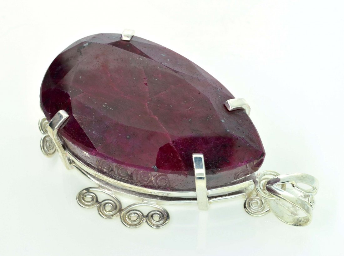 APP: 18k Sebastian 427CT Pear Cut Ruby & Silver Pendant: Designer Sebastian 427.08CT Pear Cut Ruby and Sterling Silver Pendant - Appraisal Value: $18.1K