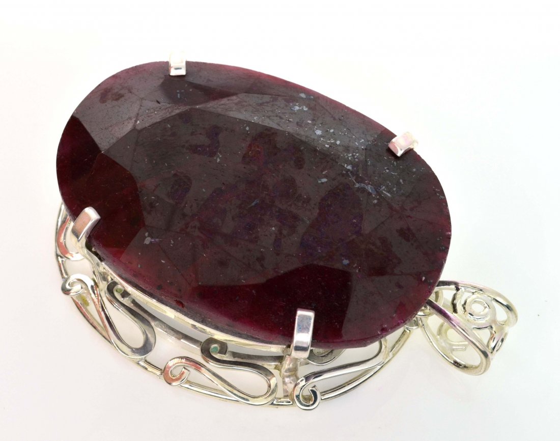 APP: 17k Sebastian 422CT Oval Cut Ruby & Silver Pendant: Designer Sebastian 422.42CT Oval Cut Ruby and Sterling Silver Pendant - Appraisal Value: $17.4K