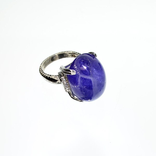 APP: 15k 14kt White Gold, 33CT Cabochon Tanzanite Ring: 14 kt. White Gold, 33.64CT Oval Cut Cabochon Tanzanite Ring