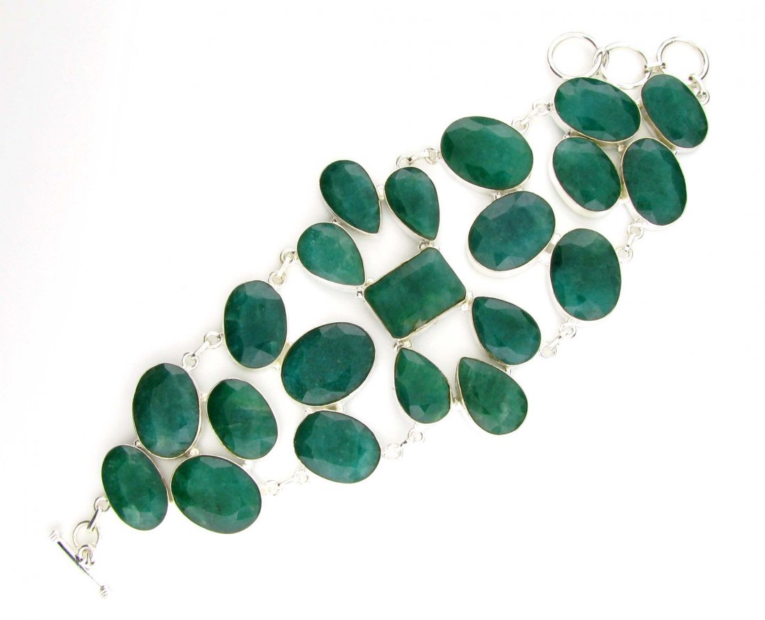 APP: 14k 182CT Mixed Cut Grn Beryl & Silver Bracelet: 182.76CT Mixed Cut Green Beryl and Sterling Silver Bracel