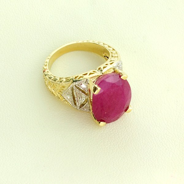 APP: 10.7k 14kt Yellow & White Gold, 12.11CT Ruby Ring: 14 kt. Yellow & White Gold, 12.11CT Ruby Ring Retail Replacement Value