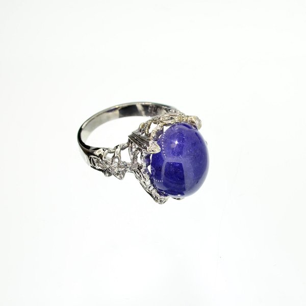 APP: 9k 14kt White Gold, 18CT Cabochon Tanzanite Ring: 14 kt. White Gold, 18.23CT Oval Cut Cabochon Tanzanite Ring