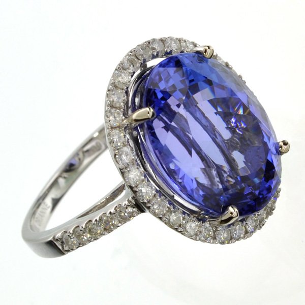 APP: 32k *14 kt White Gold Tanzanite & Diamond Ring: *14 kt White Gold 12.71CT Oval Cut Tanzanite and Diamond Ri