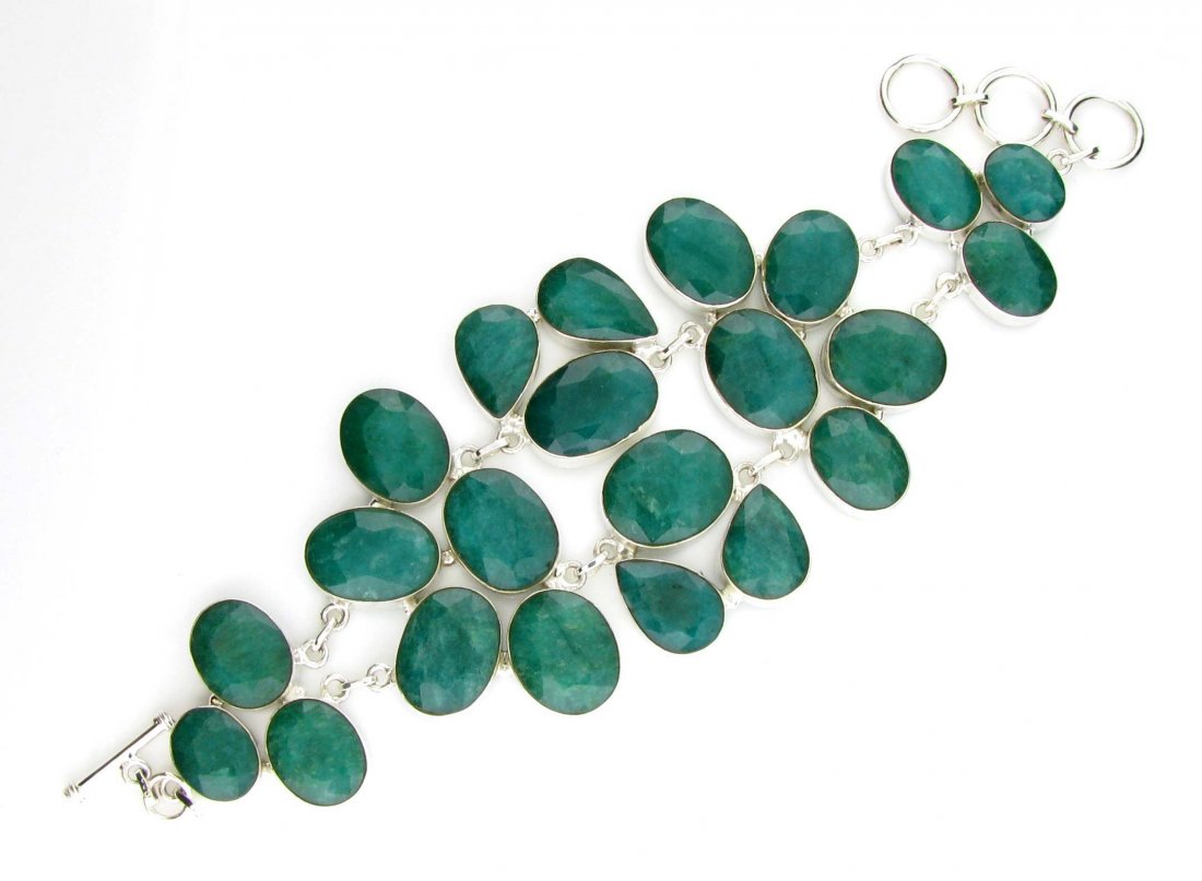 APP: 14k 190CT Mixed Cut Grn Beryl & Silver Bracelet: 190.63CT Mixed Cut Green Beryl and Sterling Silver Bracel