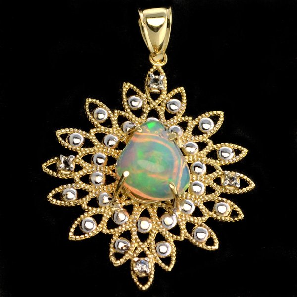 APP: 6k 14kt Yellow & White Gold, Opal & Topaz Pendant: 14 kt. Yellow and White Gold, 3.54CT Crystal Opal a