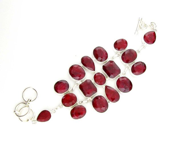APP: 9k 113CT Mixed Cut Ruby & Sterl Silver Bracelet: 113.47CT Mixed Cut Ruby and Sterling Silver Bracelet Retail