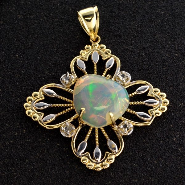 APP: 5k 14kt Gold, 4CT Crystal Opal & Topaz Pendant: 14 kt. Yellow and White Gold, 4.73CT Crystal Opal a