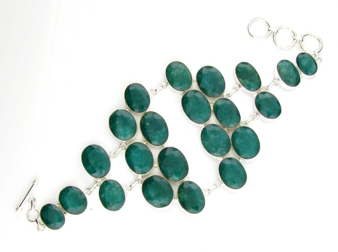 APP: 14k 187CT Oval Cut Grn Beryl & Silver Bracelet: 187.66CT Oval Cut Green Beryl and Sterling Silver Bracelet
