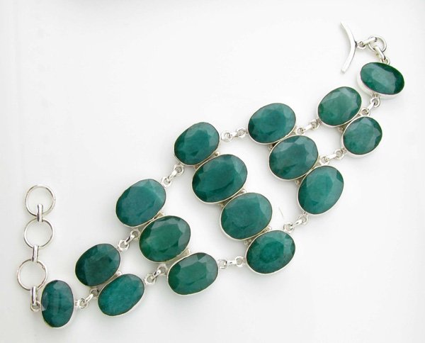 APP: 9k 108CT Oval Cut Grn Beryl & Silver Bracelet: 108.07CT Oval Cut Green Beryl and Sterling Silver Bracelet<