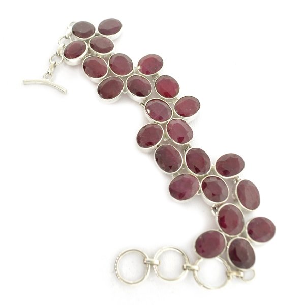 APP: 9k 81 CT Oval Cut Ruby & Sterling Silver Bracelet: 81.89CT Oval Cut Ruby and Sterling Silver Bracelet Retail Repl