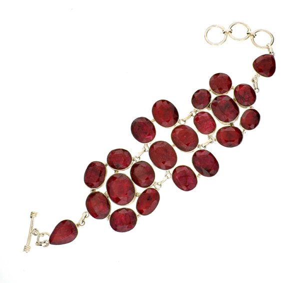 APP: 12k 142CT Mixed Cut Ruby & Sterl Silver Bracelet: 142.13CT Mixed Cut Ruby and Sterling Silver Bracelet Retail
