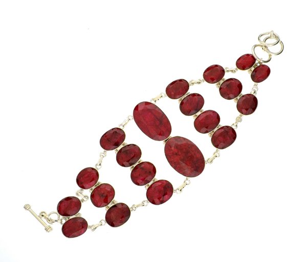 APP: 11k 139CT Oval Cut Ruby & Sterl Silver Bracelet: 139.98CT Oval Cut Ruby and Sterling Silver Bracelet Retail R