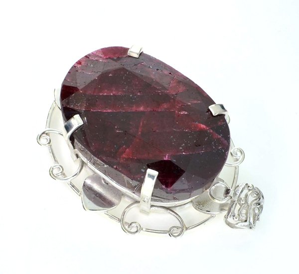 APP: 15k Sebastian 339CT Oval Cut Ruby & Silver Pendant: Designer Sebastian 339.56CT Oval Cut Ruby and