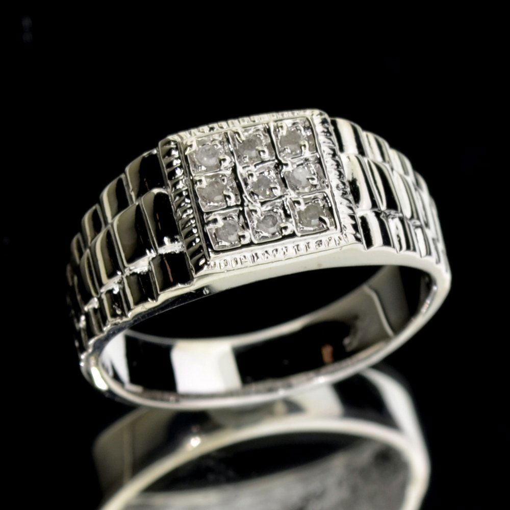 APP: 1k Round Cut Diamond & Silver Rolex Style Ring: 0.10CT Round Cut Diamond and Platinum Over Ste