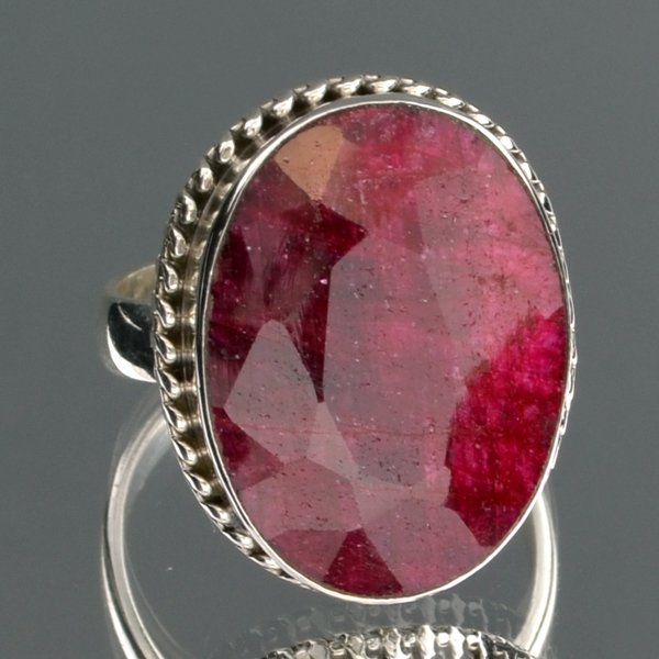 APP: 2.6k 12.18CT Oval Cut Ruby & Sterling Silver Ring: 12.18CT Oval Cut Ruby and Sterling Silver Ring Retail Replacement Valu
