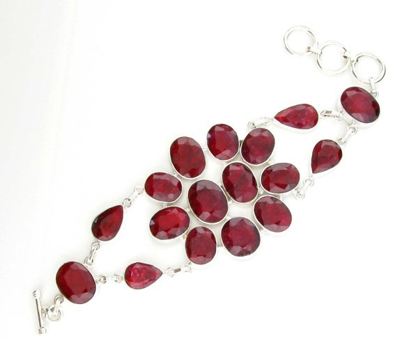 APP: 10k 119CT Mixed Cut Ruby & Sterl Silver Bracelet: 119.14CT Mixed Cut Ruby and Sterling Silver Bracelet Retail