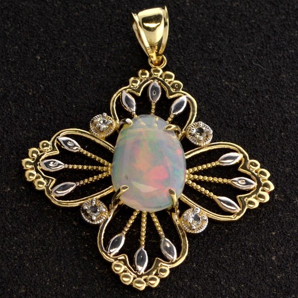 APP: 3k 14kt Yl & Wt Gold, 5CT Opal & Topaz Pendant: 14 kt. Yellow and White Gold, 5.50CT Crystal Opal a