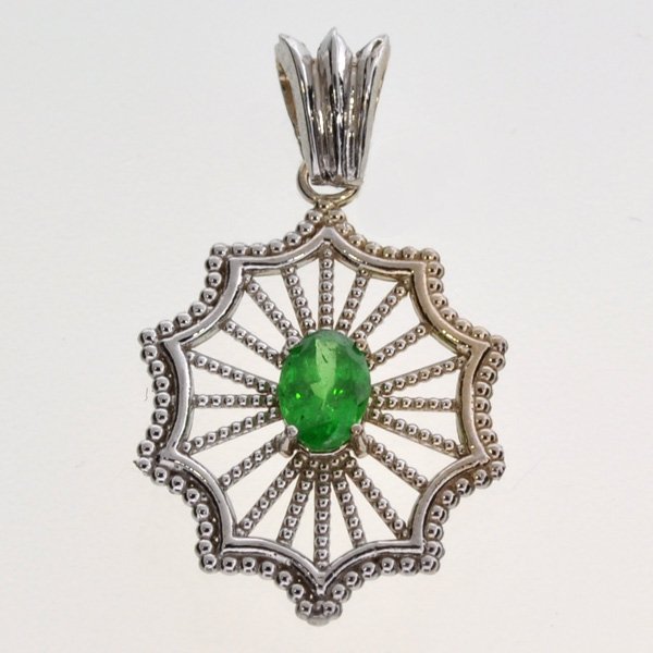 APP: 1k 14kt White Gold 0 CT Oval Cut Tsavorite Pendant: 14kt White Gold 0.56CT Oval Cut Tsavorite PendantRetail Replace