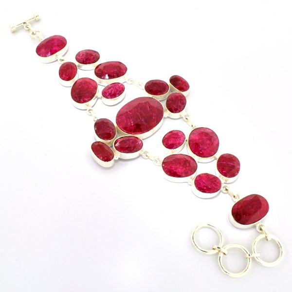 APP: 15k 198CT Oval Cut Ruby & Sterl Silver Bracelet: 198.92CT Oval Cut Ruby and Sterling Silver Bracelet Retail R