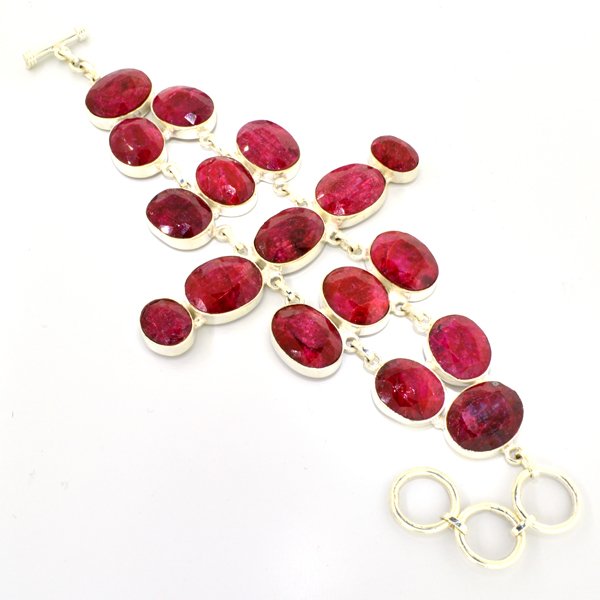 APP: 12k 140CT Oval Cut Ruby & Sterl Silver Bracelet: 140.50CT Oval Cut Ruby and Sterling Silver Bracelet Retail R