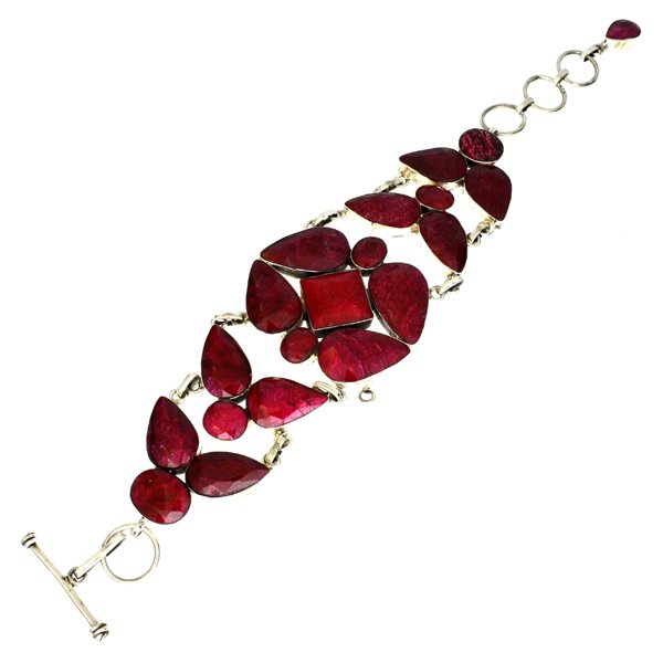 APP: 12k Sebastian 147CT Mixed Ruby & Silver Bracelet: Designer Sebastian 147.34CT Mixed Cut Ruby
