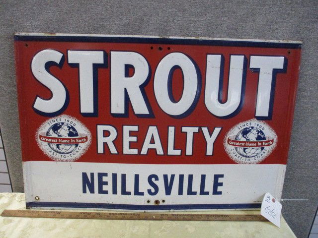 STAMPED TIN STROUT REALTY SIGN (1 of 4)