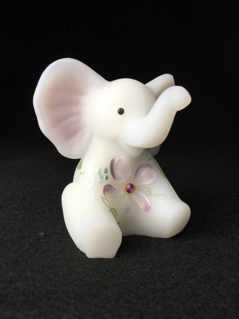 Fenton Hand Painted Elephant: This Fenton Hand Painted Elephant is white in color with hand painted flower accents. Is signed and marked Fenton(4x3x3)