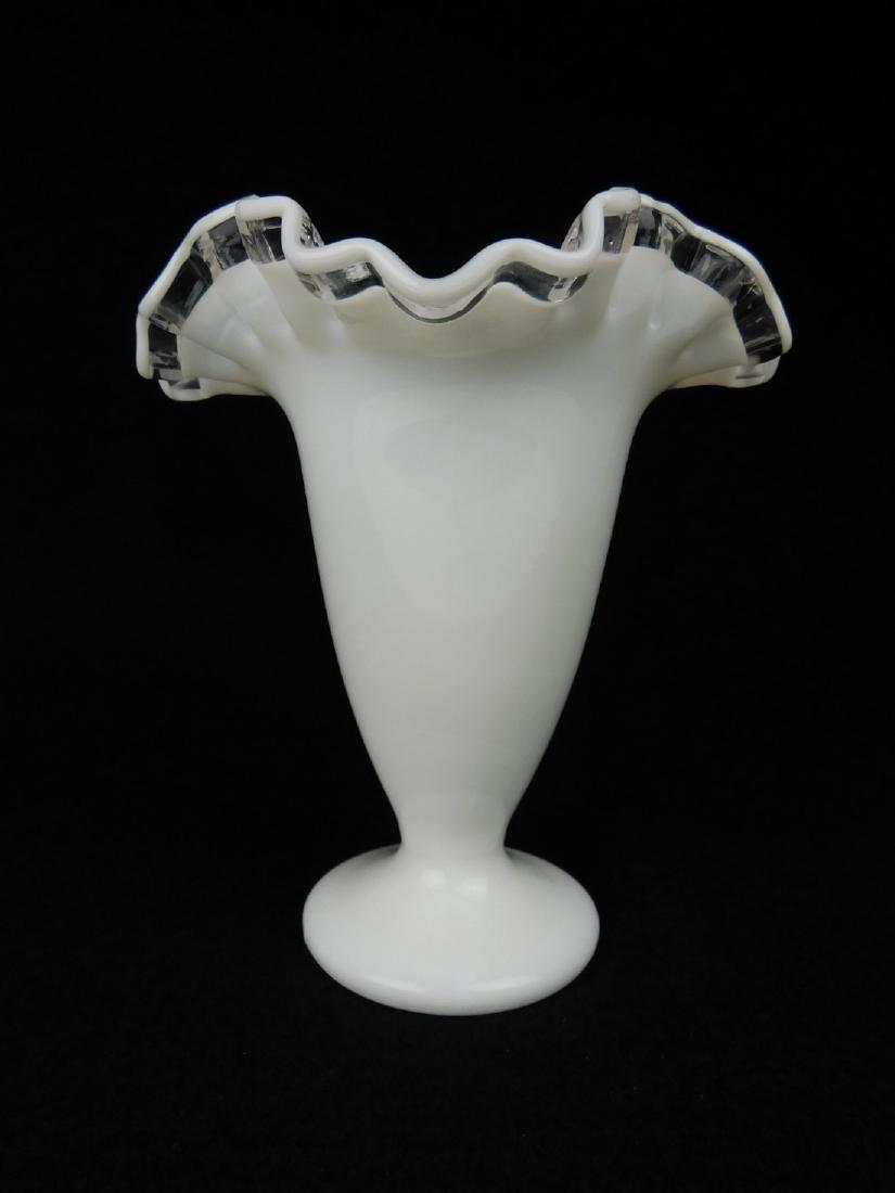 Fenton Fluted Vase: This Fenton Vase is cone shaped with a ruffled rim. Is predominately white in color with a clear rim. (7x5x5)