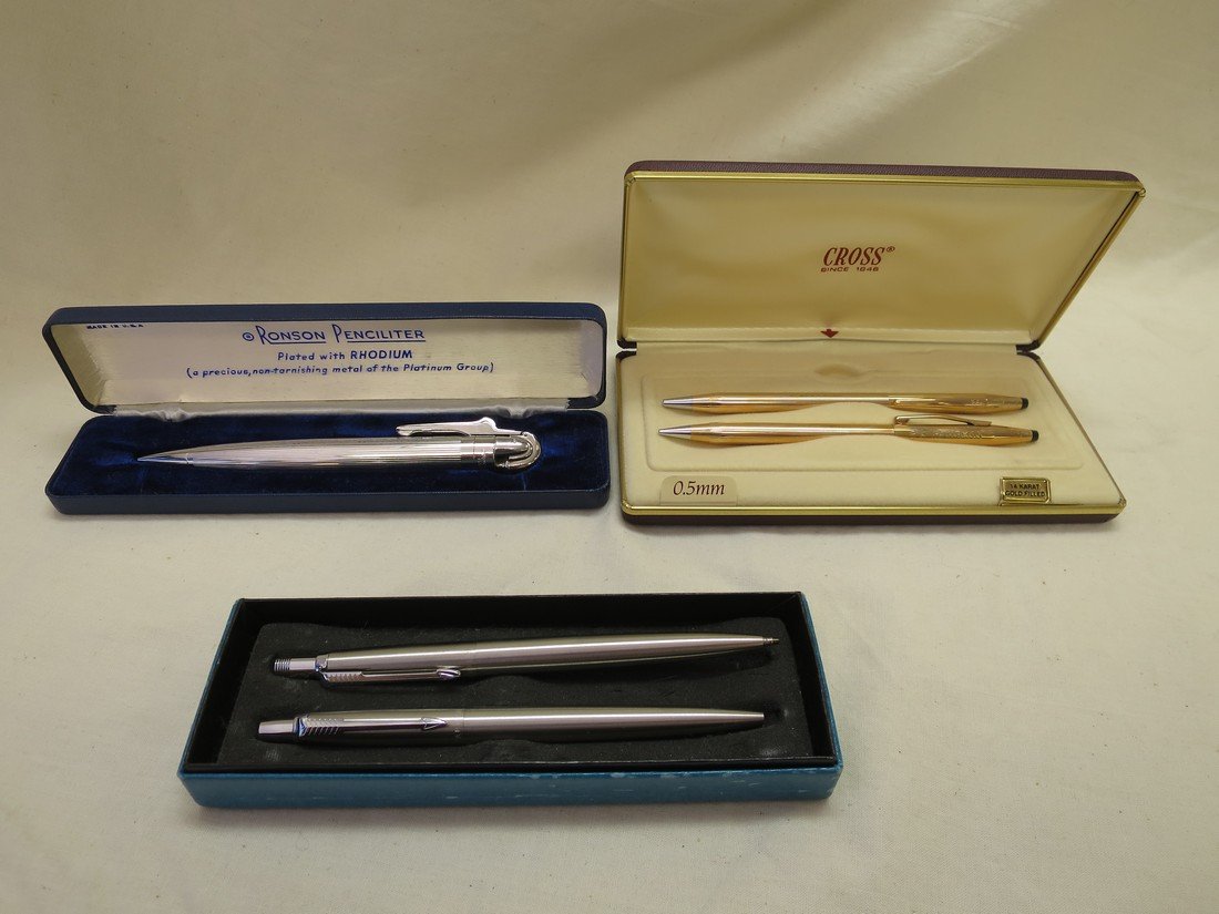 1 Ronson Penciliter pen Plated with Rhodium, 2 Cross: 1 Ronson Penciliter pen Plated with Rhodium, 2 Cross pens 14k gold filled, and 2 Parker pens.