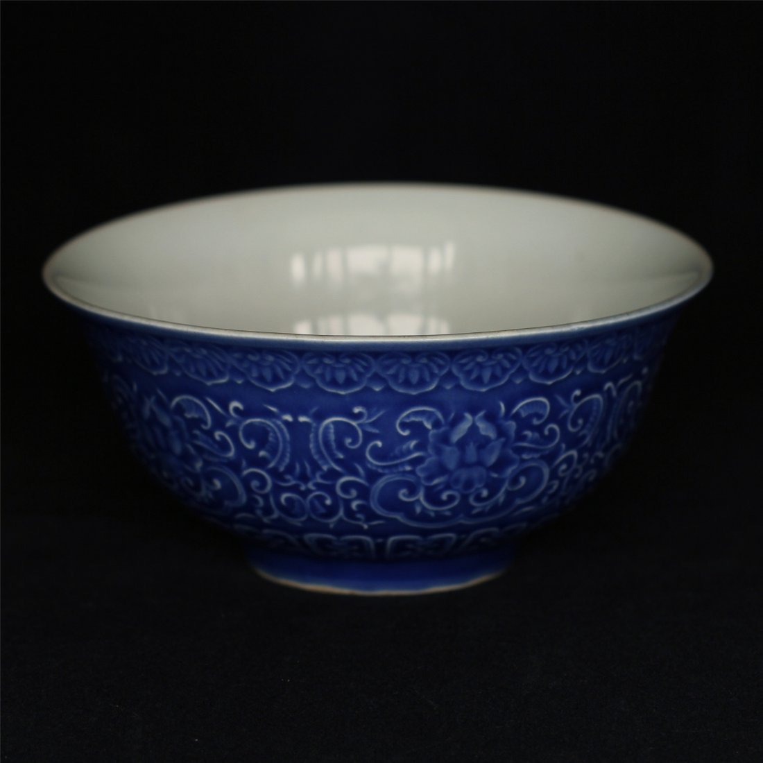 Blue glaze carving porcelain bowl of Ming Dynasty: Blue glaze carving porcelain bowl of Ming Dynasty XuanDe mark. Measure(inch), Height: 2-7/8, Diameter: 6-1/4.