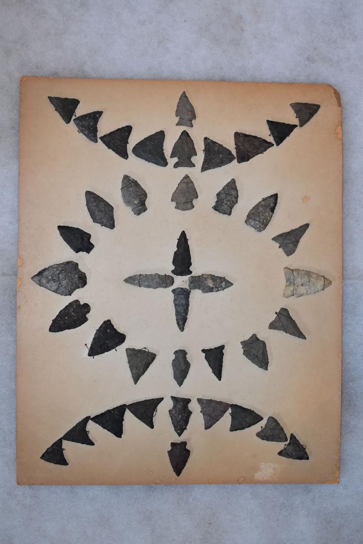 Bank Window lot of New England Arrowheads: This is a frame of arrowheads that was displayed in the early 1900's in the bank window of the Boston Federal Way in Boston MA. The cardboard frame and wired arrowheads makes a nice display. The cardb