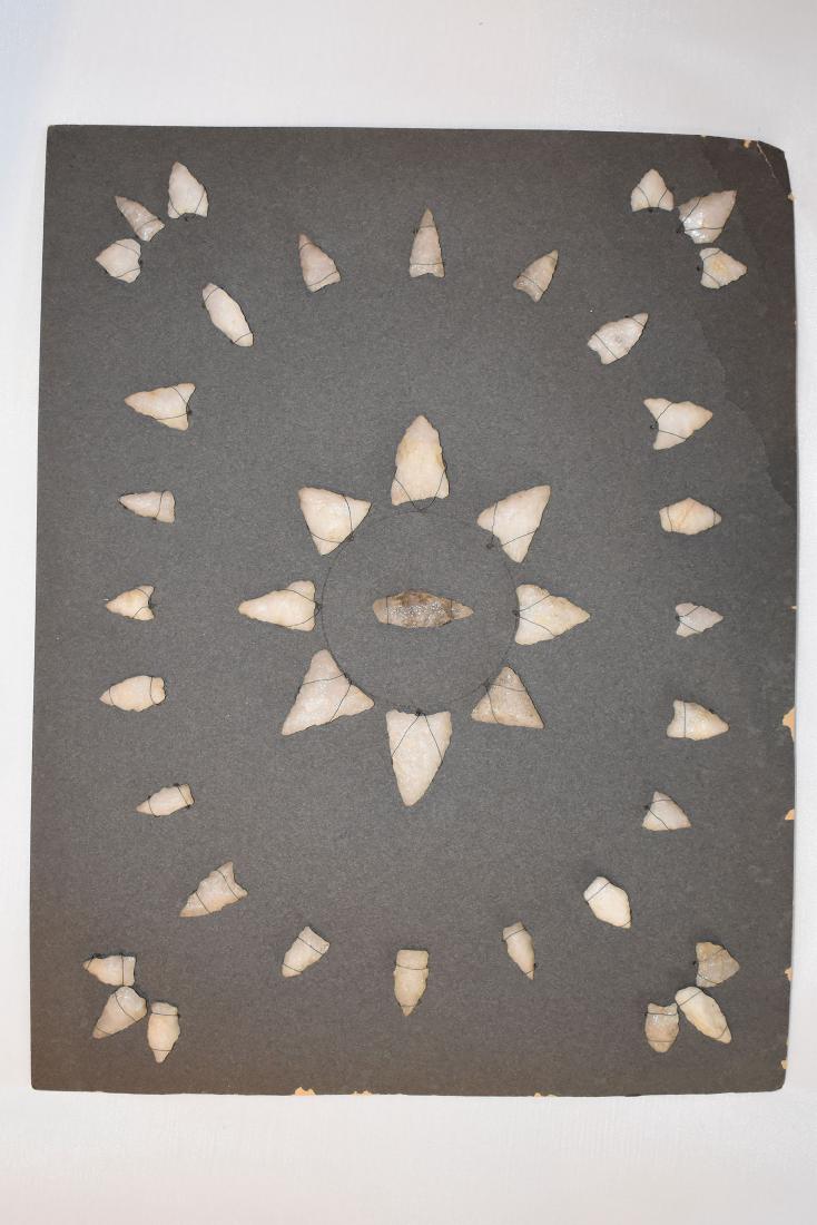 Bank Window lot of New England Arrowheads: This is a frame of arrowheads that was displayed in the early 1900's in the bank window of the Boston Federal Way in Boston MA. The cardboard frame and wired arrowheads makes a nice display. The cardb