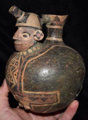 6 1/2" tall Peruvian pottery vessel, broken and glued (1 of 12)
