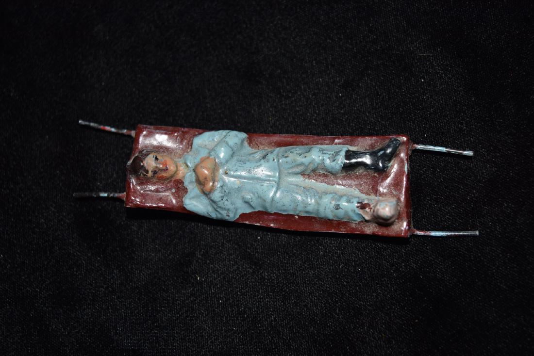 Injured Man on Stretcher Toy England WWI Era: Injured Man on Stretcher Toy England WWI Era