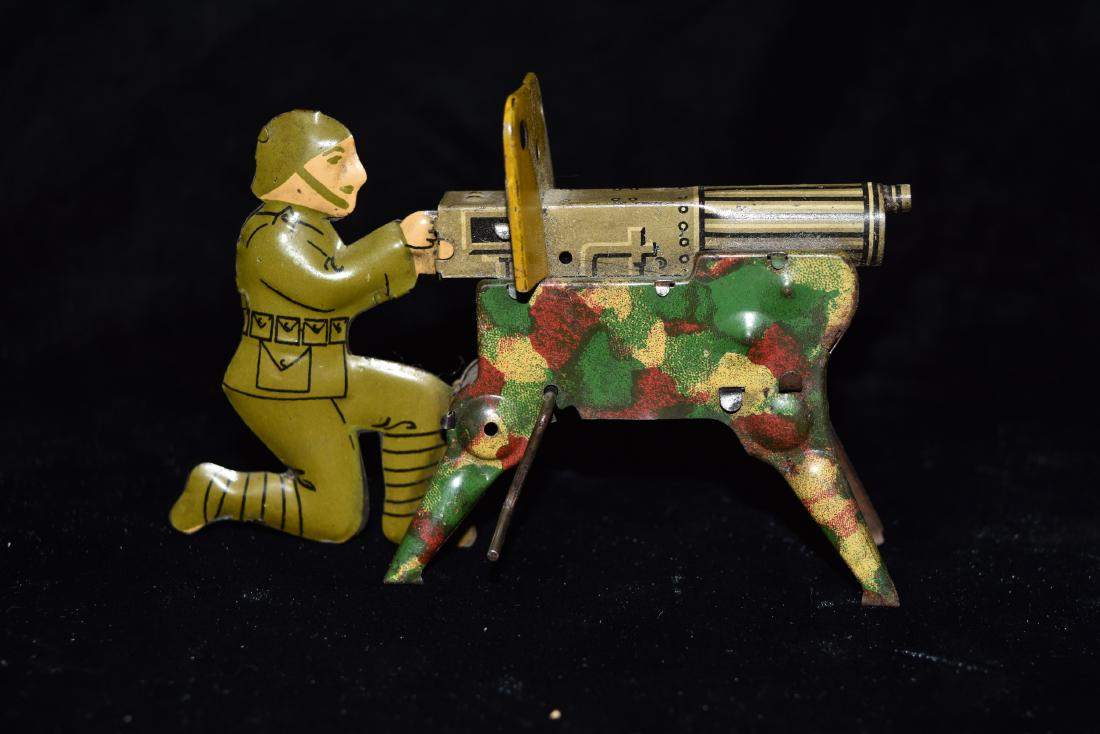 Pressed Metal German WWII Soldier with Machine Gun Wind: Pressed Metal German WWII Soldier with Machine Gun Wind Up Toy European Early 20th Century